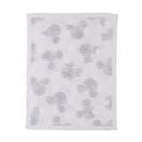 Barefoot Dreams Disney Stroller Blanket in Mickey Stamped, a pale gray blanket with tonal Mickey silhouettes