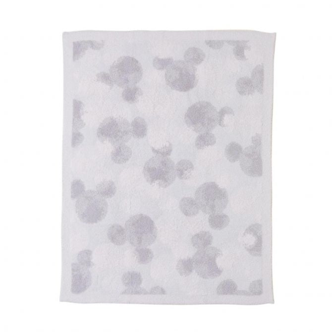 Barefoot Dreams Disney Stroller Blanket in Mickey Stamped, a pale gray blanket with tonal Mickey silhouettes