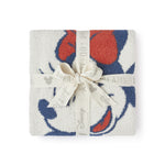 Barefoot Dreams Disney Stroller Blanket in Minnie Love folded and tied with a Disney ribbon
