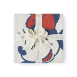 Barefoot Dreams Disney Stroller Blanket in Minnie Love folded and tied with a Disney ribbon