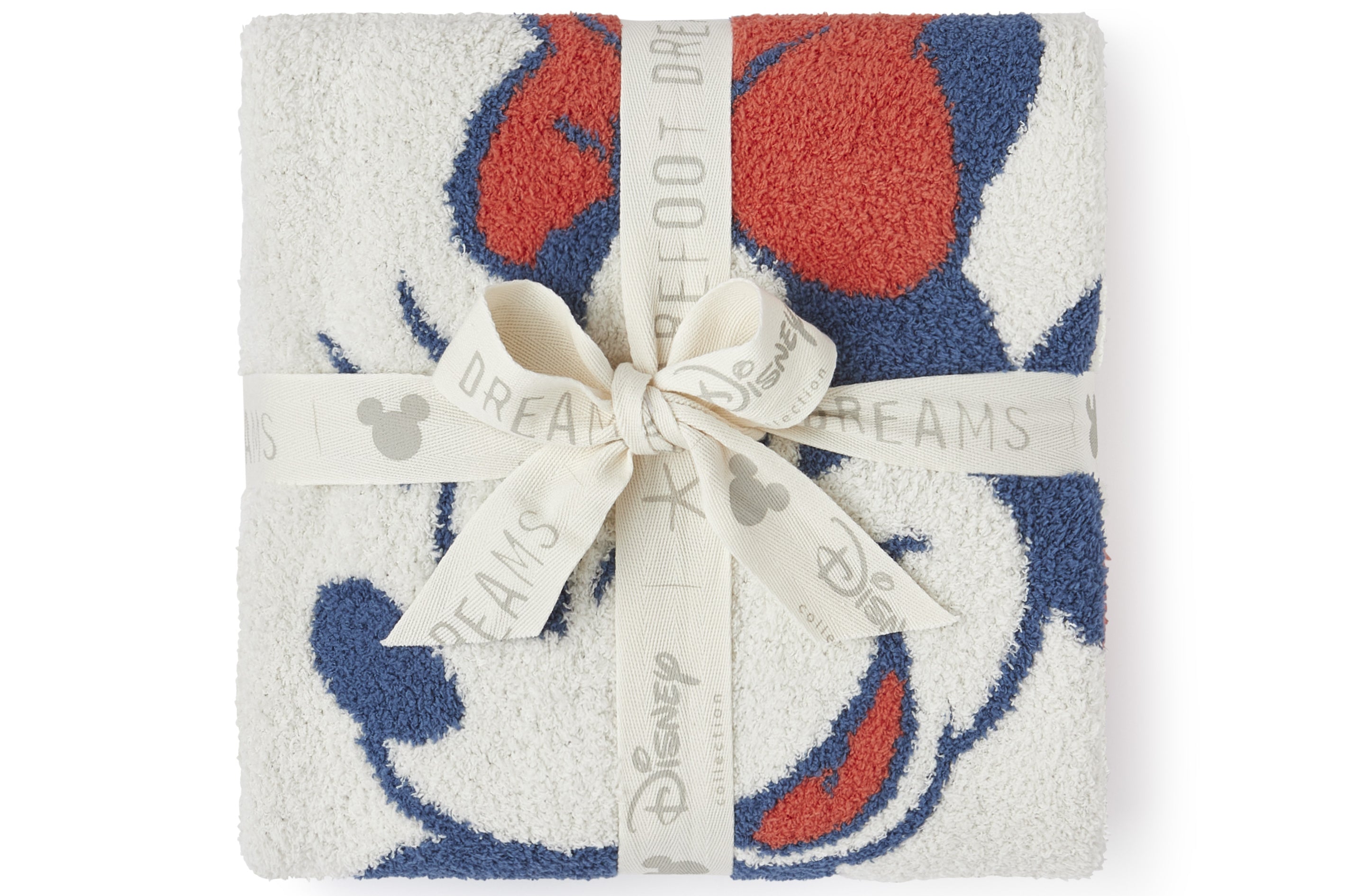 Barefoot Dreams Disney Stroller Blanket in Minnie Love folded and tied with a Disney ribbon