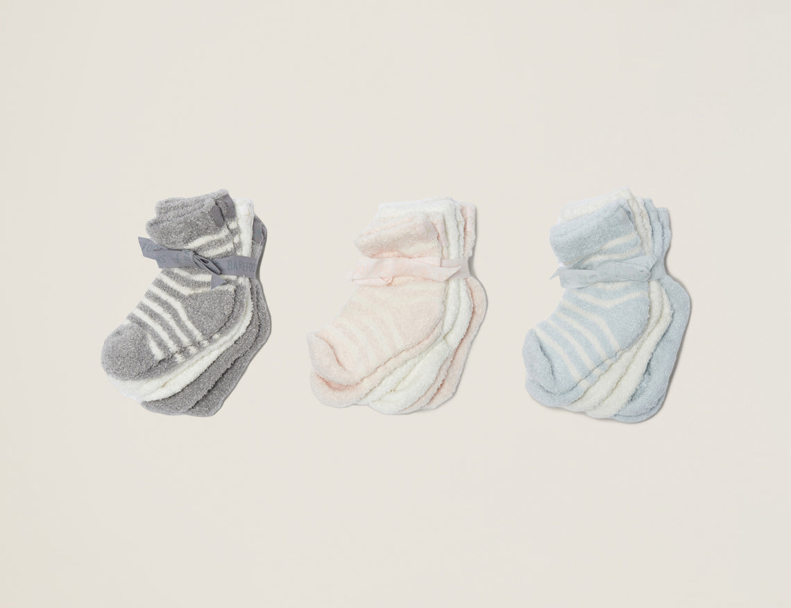 Barefoot Dreams Infant Socks 3 Packs in gray, pink and blue laid side by side