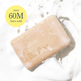 Beekman 1802 Bar Soap splashing in milk with the text Over 60M bars sold