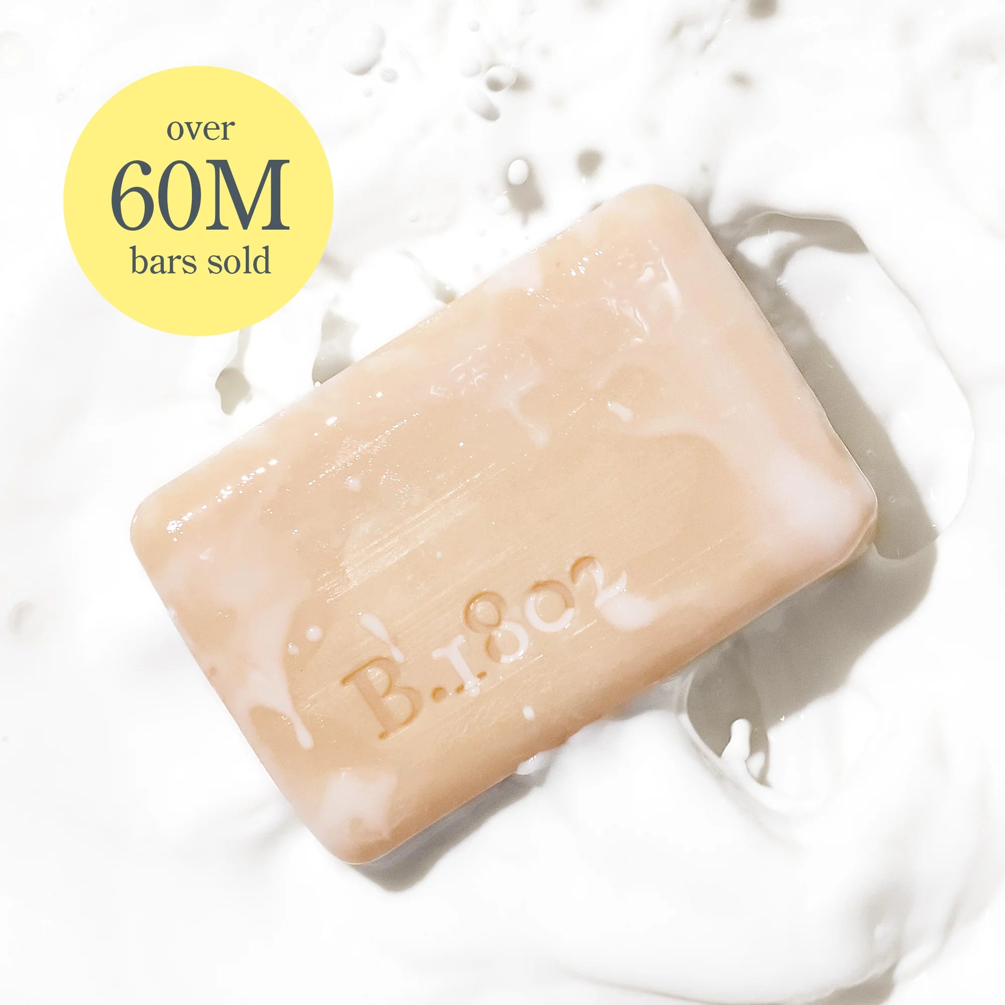Beekman 1802 Bar Soap splashing in milk with the text Over 60M bars sold