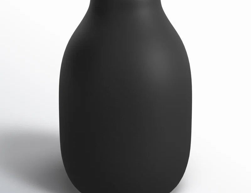 Blomus COLORA Porcelain Vase in Peat, a matte black bottle-shaped vase