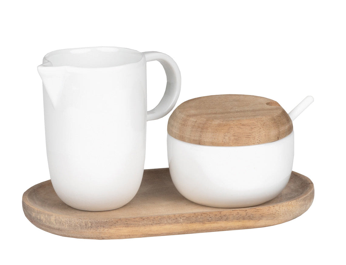 Blomus Cream and Sugar Service Tray, a white porcelain creamer and lidded sugar bowl on a wooden tray