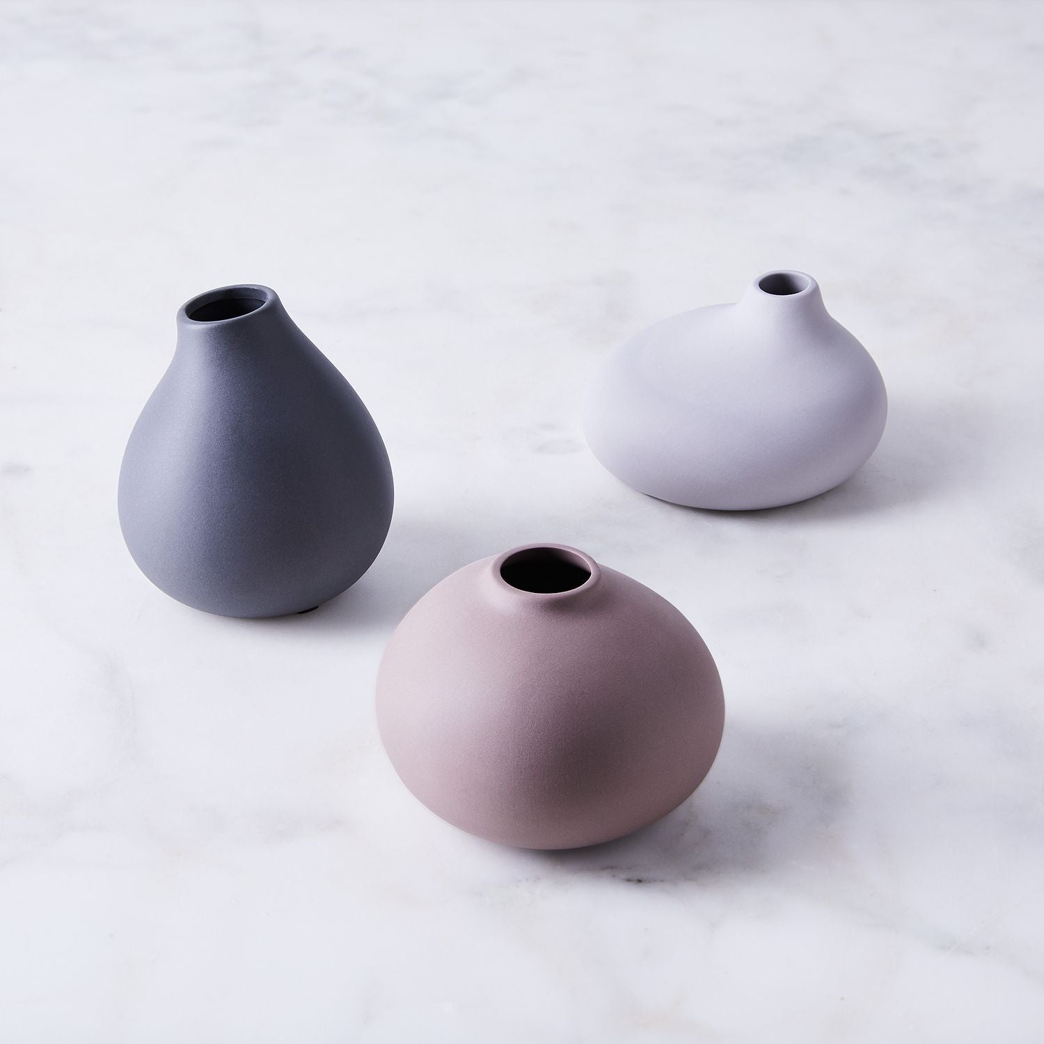 Blomus Nona 3 Vase Set, three small matte ceramic bud vases in charcoal, mauve and lavender