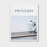 Book of Proverbs KJV hardcover with a white cover and a photo of a plant on a windowsill