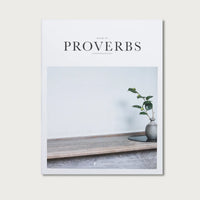 Book of Proverbs KJV hardcover with a white cover and a photo of a plant on a windowsill
