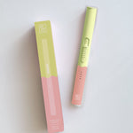 Botanica Flameless Lighter in Sherbet, a lime green and peach USB lighter beside its box