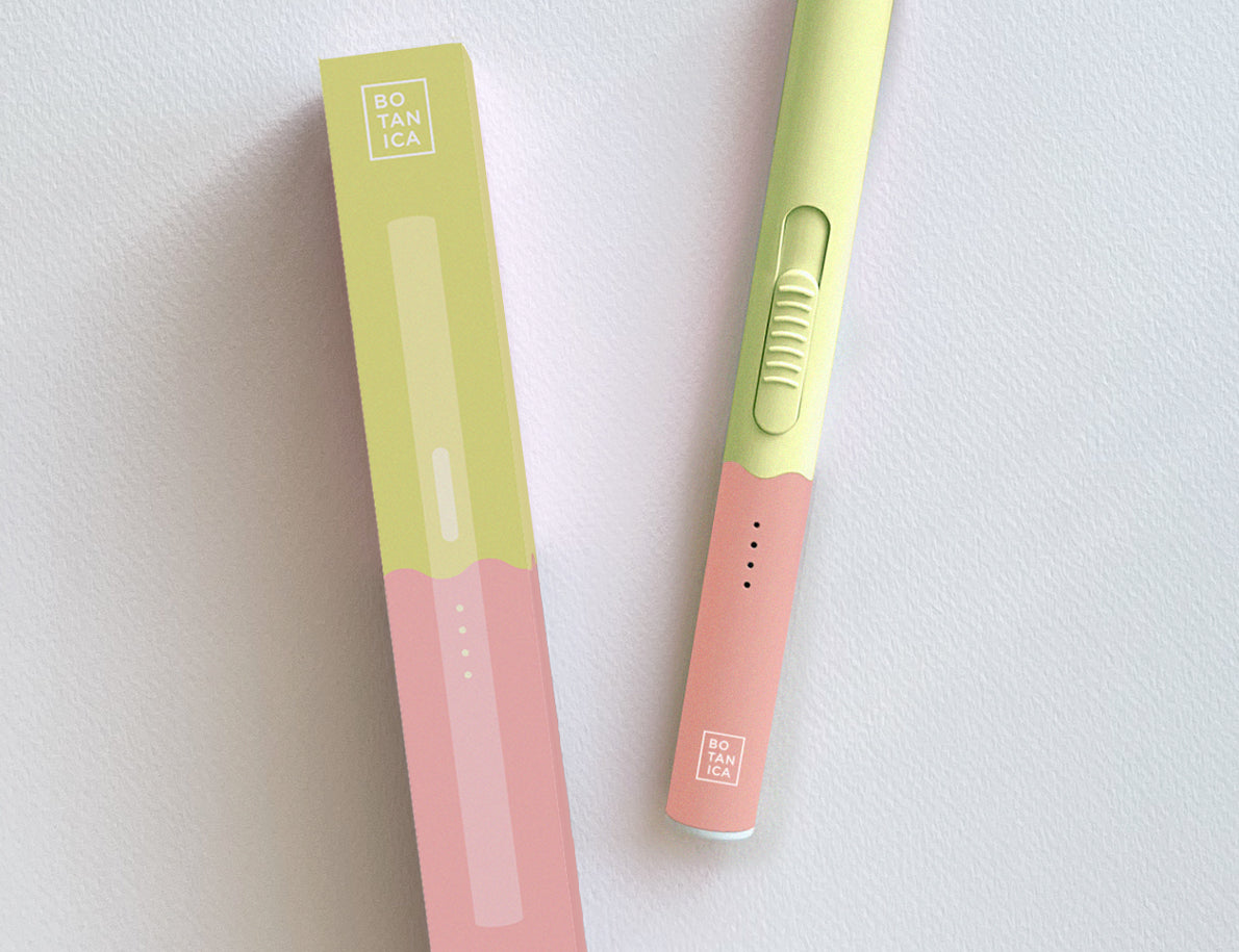 Botanica Flameless Lighter in Sherbet, a lime green and peach USB lighter beside its box