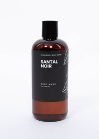 Broken Top Brands Santal Noir Body Wash in an amber bottle with a black pump