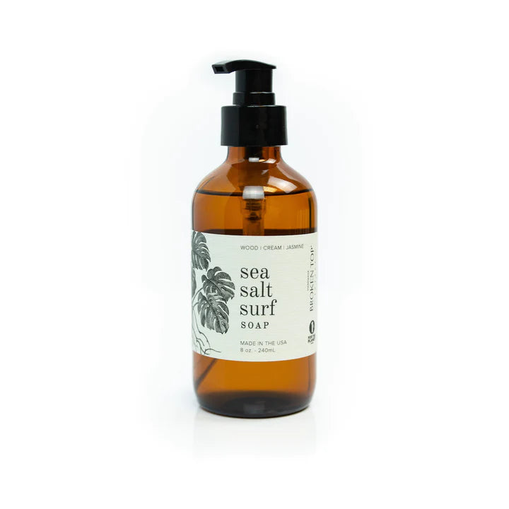 Broken Top Brands Sea Salt Surf Hand Soap in an amber glass pump bottle with a monstera label