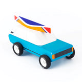 Candylab Toys Cotswold Wooden Royal Toy, a blue wooden car with a roof surfboard, angled view