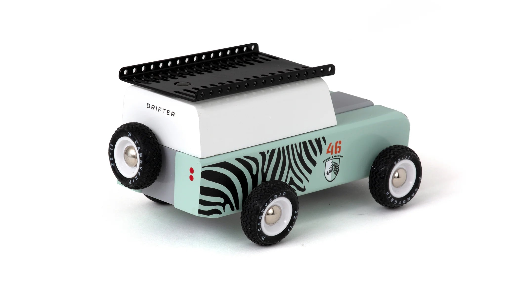 Candylab Toys Drifter Zebra Toy Truck, mint wooden SUV with zebra stripes, angled view