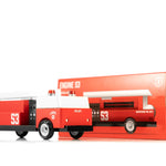 Candylab Toys Engine 53 Wooden Fire Truck beside its red retail box