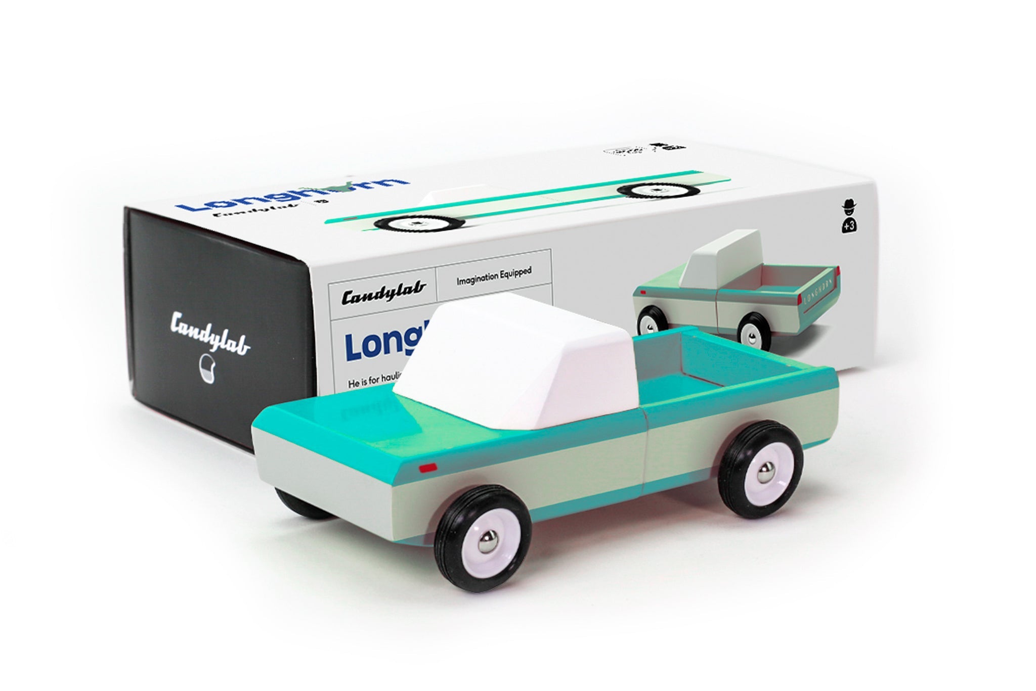 Candylab Toys Longhorn Toy Truck beside its white and teal retail box
