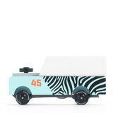 Candylab Toys Mini Zebra Drifter, a small mint wooden SUV with zebra stripes and a white roof, side view
