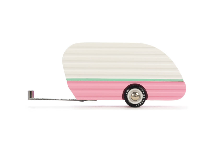 Candylab Toys Mojave Camper, a cream and pink wooden teardrop camper trailer, side view