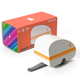 Candylab Toys Rosebud Toy Camper beside its orange rainbow retail box