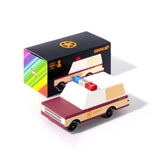 Candylab Toys Sheriff Truck beside its black and rainbow retail box