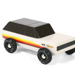 Candylab Toys Wanderer Toy Truck, cream wooden SUV with retro stripes, front angled view