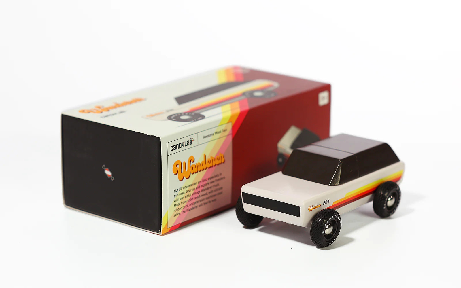 Candylab Toys Wanderer Toy Truck beside its retro striped retail box