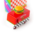 Candylab Toys Wooden Hamburger Van, red Patty's food truck with a burger on top, angled view
