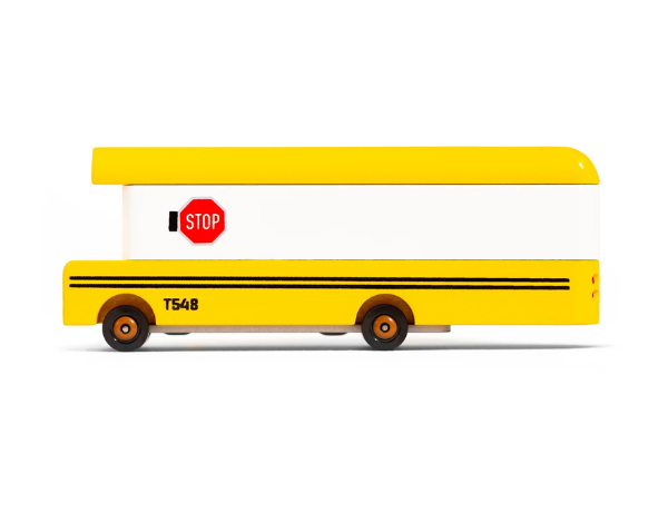 Candylab Toys Wooden School Bus, a yellow wooden bus with a stop sign, side view