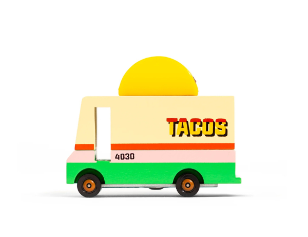Candylab Toys Wooden Taco Van, a cream and green van with a taco on the roof, side view