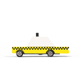 Candylab Toys Yellow Wooden Taxi, a yellow checkered taxi with a white roof, side view