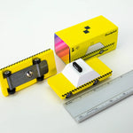 Candylab Toys Yellow Wooden Taxi with its retail box and a ruler showing its size
