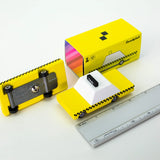 Candylab Toys Yellow Wooden Taxi with its retail box and a ruler showing its size