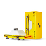 Candylab Toys Yellow Wooden Taxi beside its yellow Candycar retail box