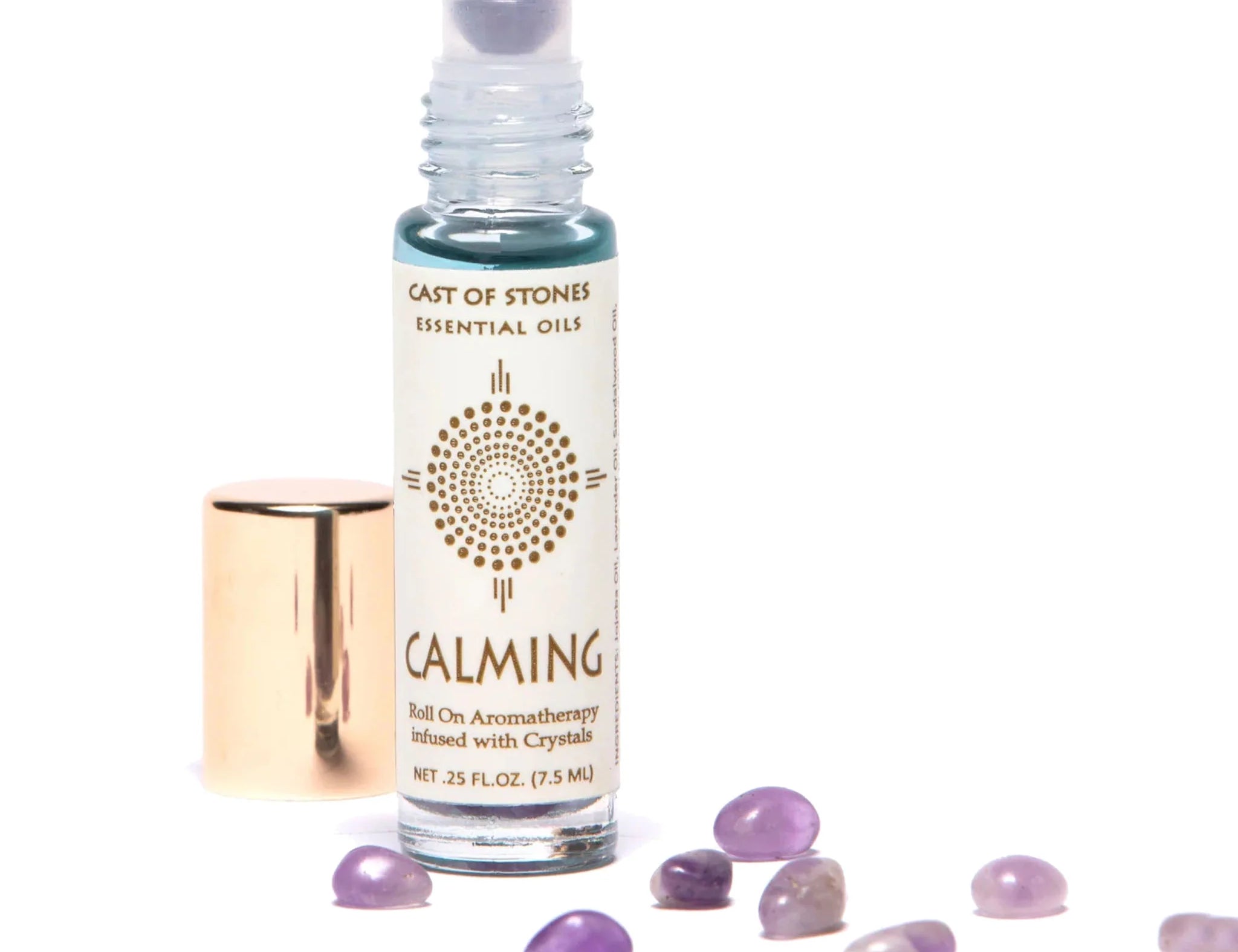 Cast of Stones Roll On Aromatherapy Calming Oil with an amethyst rollerball and loose amethyst stones