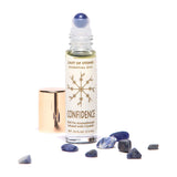 Cast of Stones Roll On Aromatherapy Confidence Oil with a sodalite rollerball and loose sodalite stones