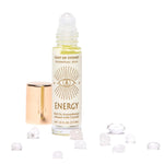 Cast of Stones Roll On Aromatherapy Energy Essential Oil with a clear quartz rollerball and loose stones