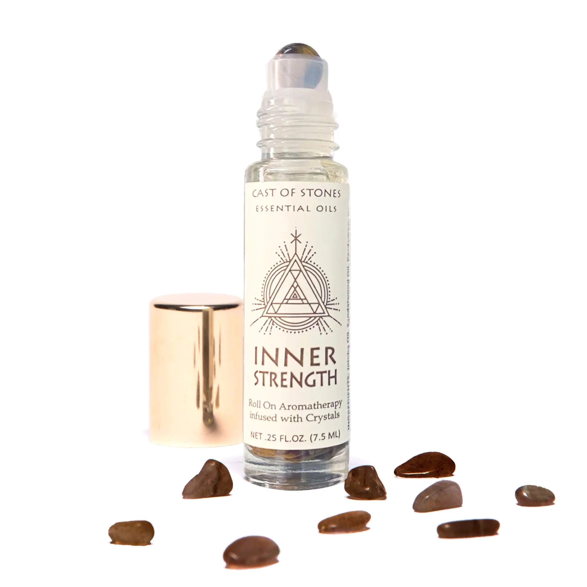 Cast of Stones Roll On Aromatherapy Inner Strength Oil with a tiger eye rollerball and loose stones