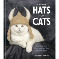 Cat-Hair Hats for Cats book cover with a white cat wearing a felted viking hat
