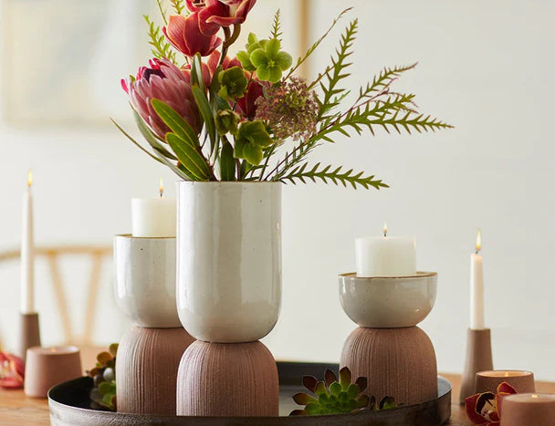 Citrine Canyon Tabletop Vessels styled on a black tray with flowers and candles on a wooden table