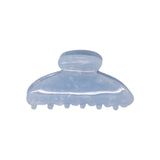 Classic claw clip in Moonstone, a glossy translucent pale blue hair claw clip, on a white background.