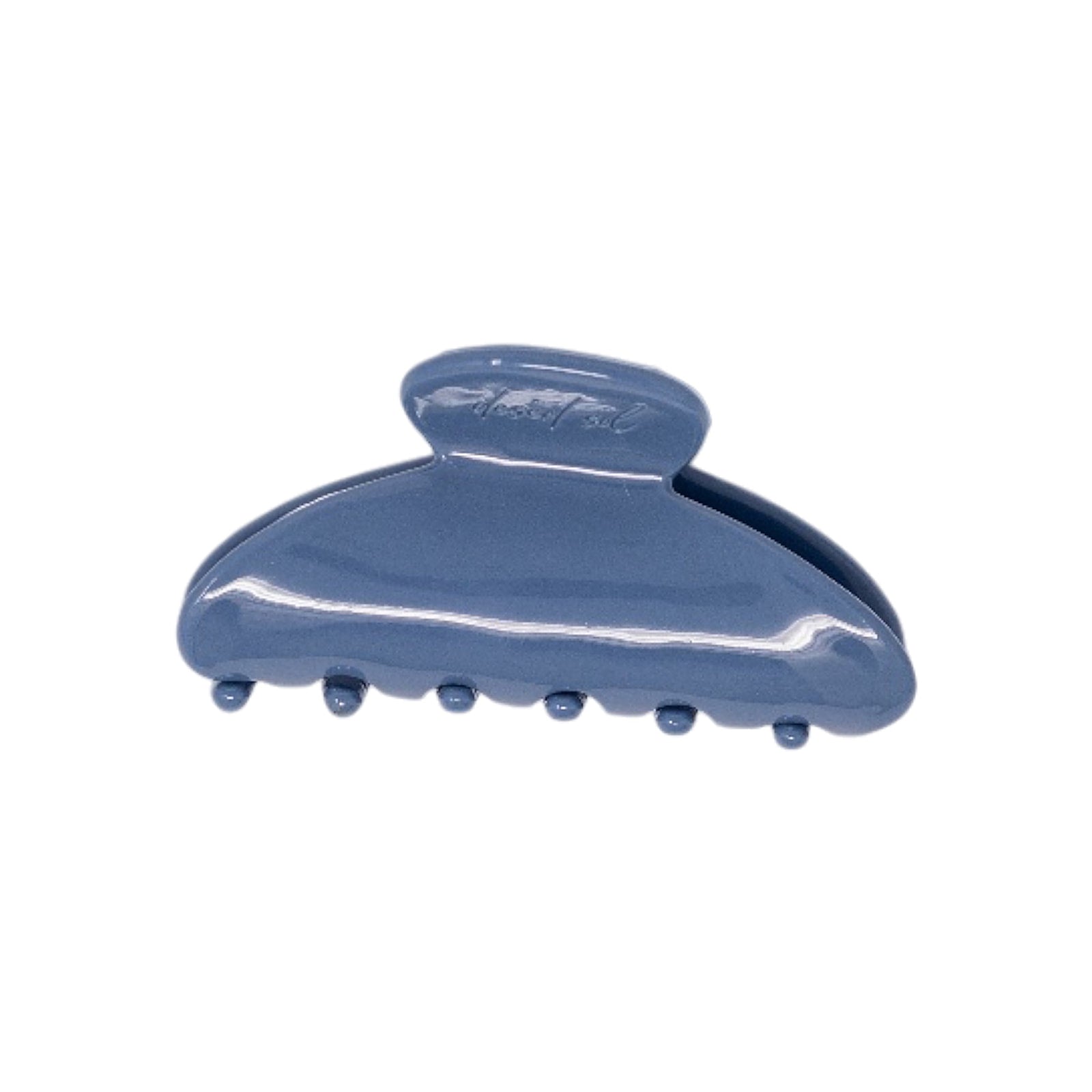 Classic claw clip in Storm Blue, a glossy deep blue hair claw clip, on a white background.
