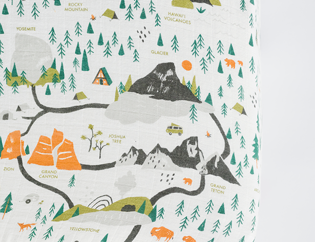 Close-up of the illustrated national parks map print on the Clementine Kids National Parks Crib Sheet