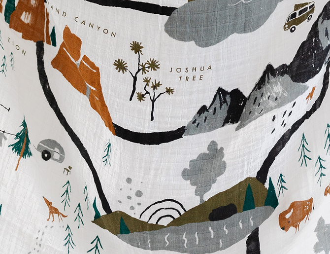 Close-up of the illustrated national parks map print on the Clementine Kids National Parks Swaddle