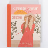 Collective Hub Create Your Best Life Journal, a coral hardcover with an illustrated woman in a red dress