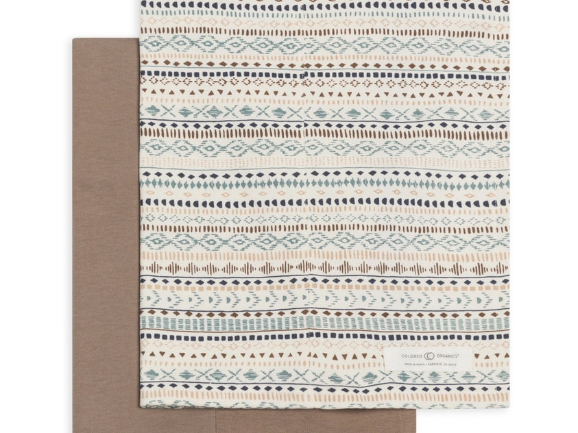 Colored Organics 2-Pack Organic Baby Burp Cloths in Southwest and Taupe, one solid taupe cloth and one cream cloth with a striped Southwest pattern in navy, teal and rust