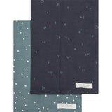 Colored Organics 2-Pack Organic Baby Burp Cloths in Square Dot and Cactus Navy, one sage green polka dot cloth and one navy cloth with a small cactus print