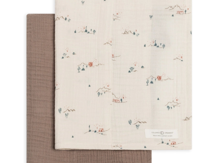 Colored Organics 2-Pack Organic Baby Muslin Burp Cloth in Desert and Taupe, one solid taupe cloth and one ivory cloth with a tiny desert cactus print