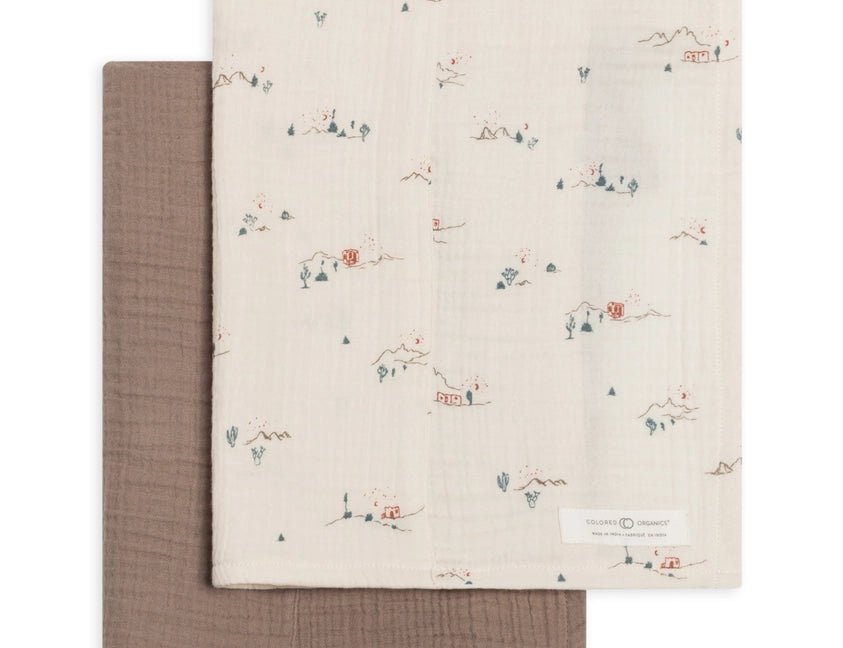 Colored Organics 2-Pack Organic Baby Muslin Burp Cloth in Desert and Taupe, one solid taupe cloth and one ivory cloth with a tiny desert cactus print