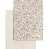 Colored Organics 2-Pack Organic Baby Muslin Burp Cloth in Yuma Floral and Ivory, one ivory cloth and one cloth with a rust and sage leaf print